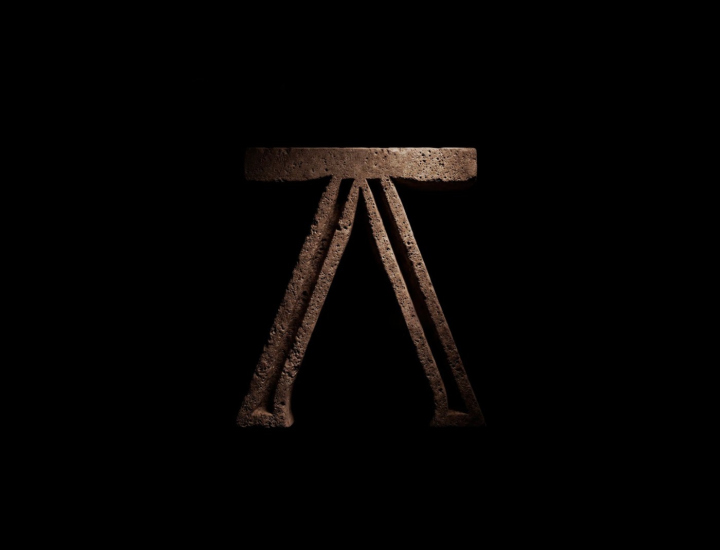 Casa Macui Mexican knife brand identity leather knife roll with directional lighting on terracotta surface