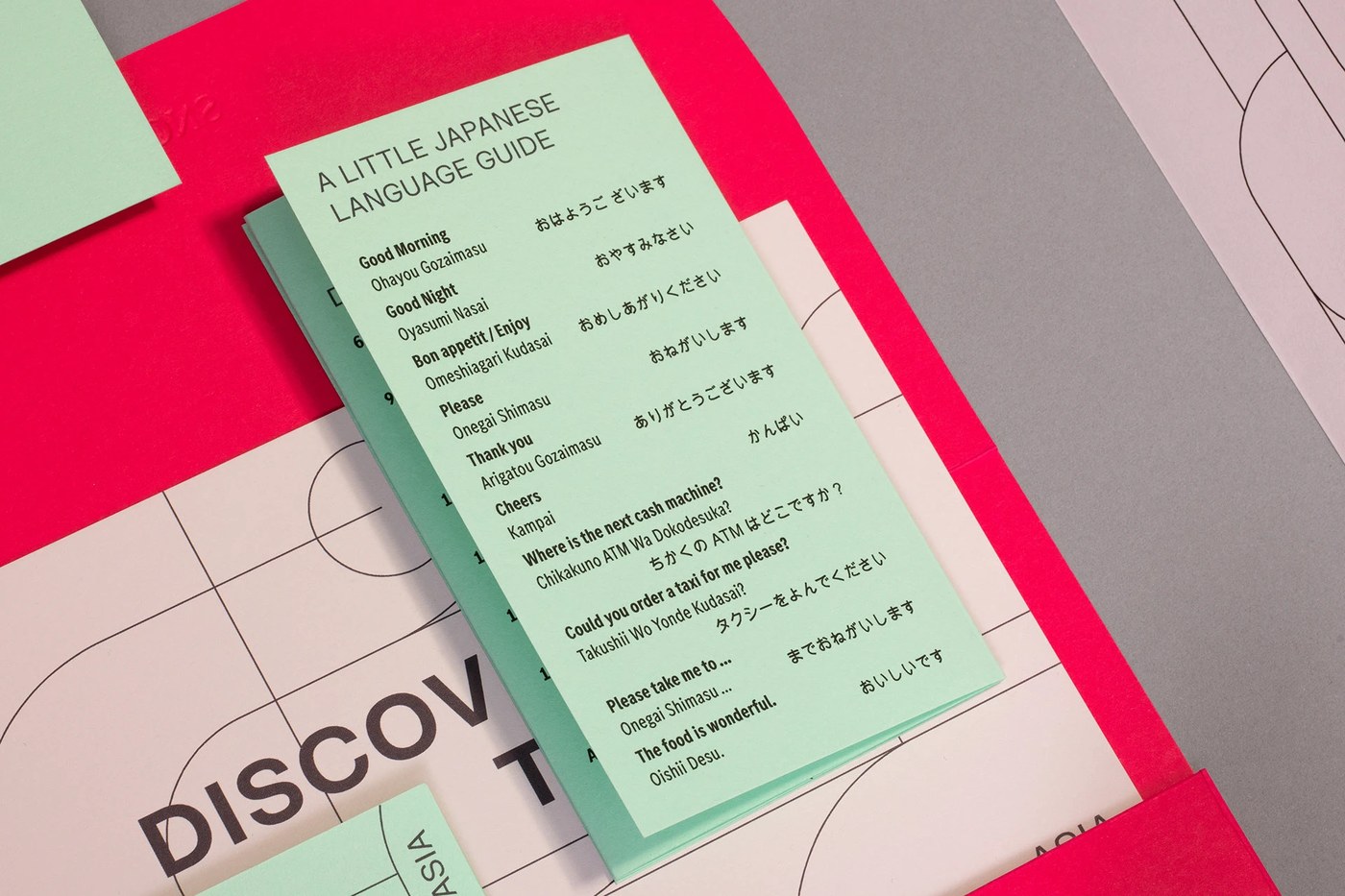detail of a Tokyo-themed design with red lines and clean white visual identity space