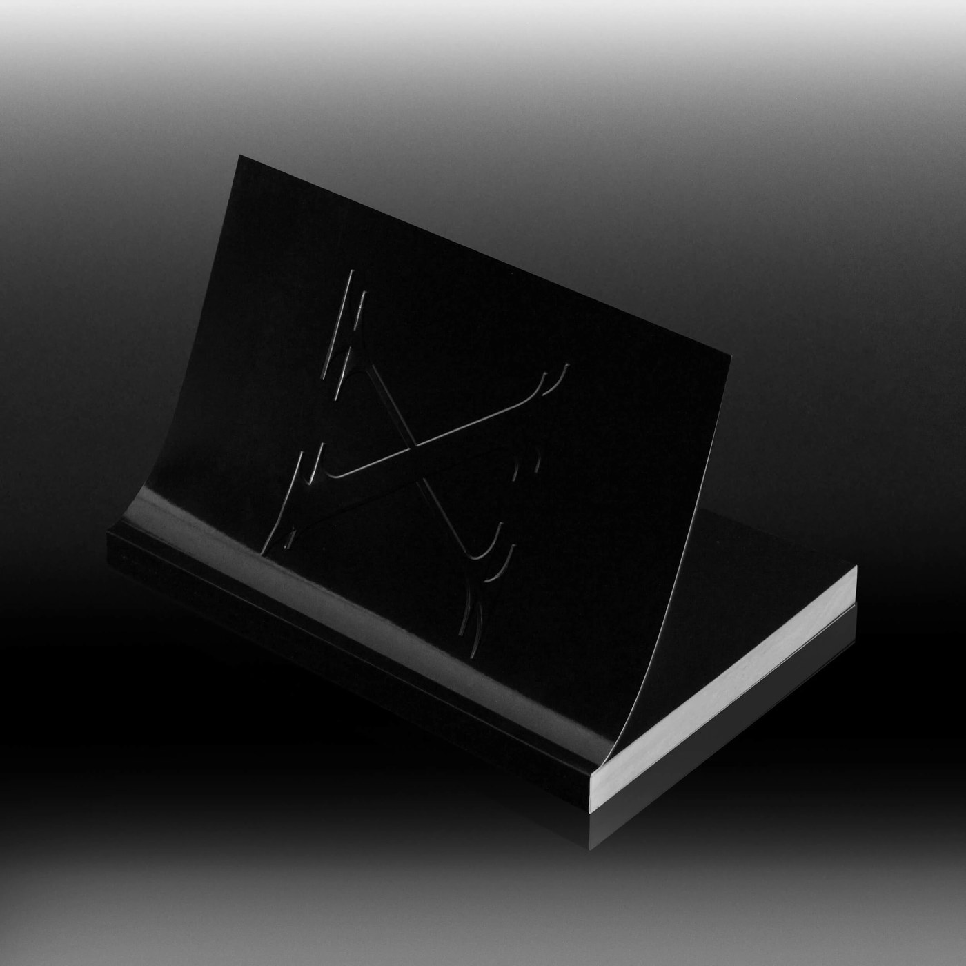display serif typeface design paperback book lying half open