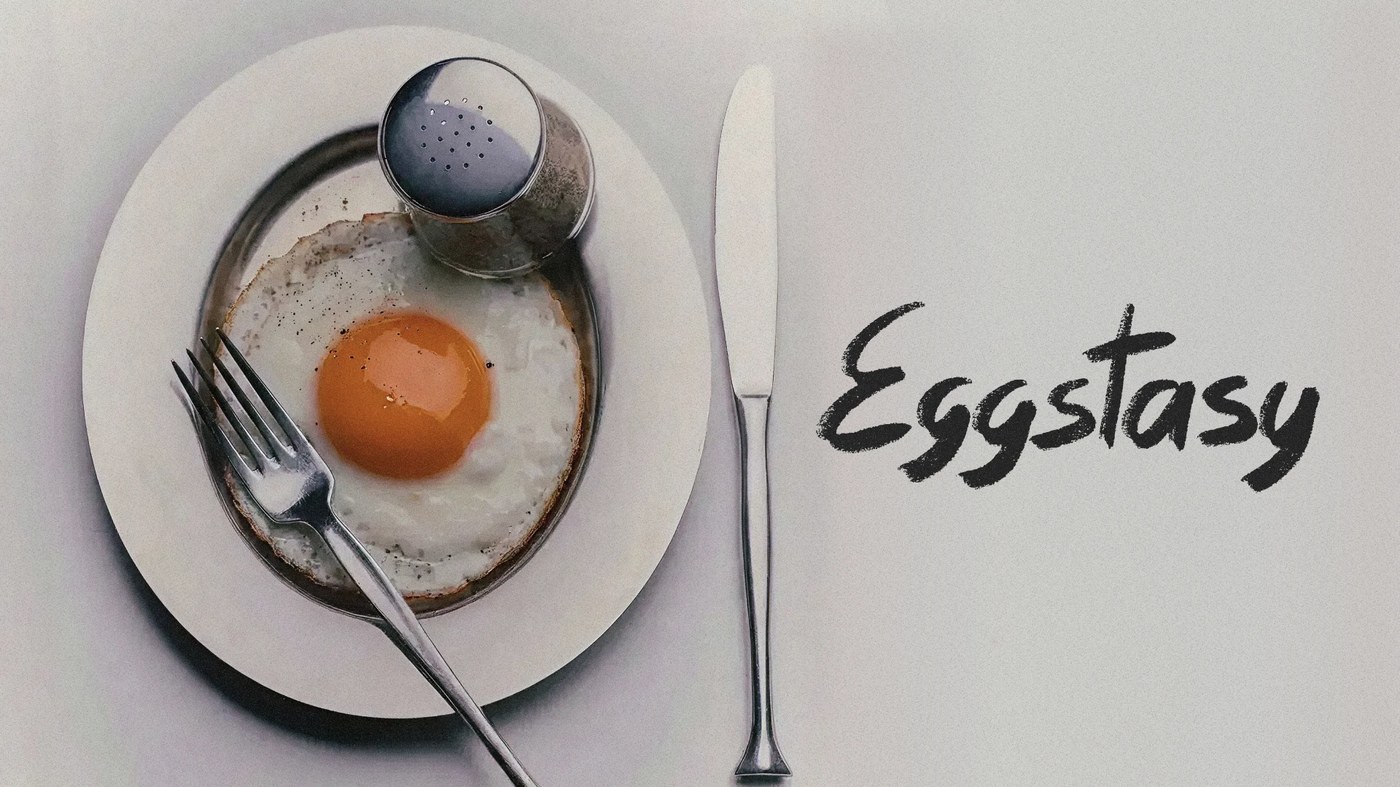 Eggstasy logo brand identity brush-script logotype on warm grey background