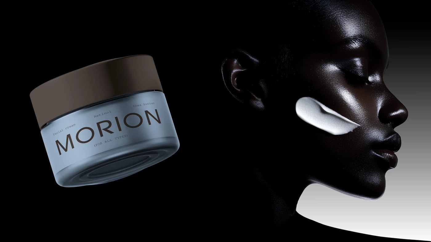 Cosmetics packaging design showcasing close-up textures of the thick paper boxes and embossed tactile logo lettering.