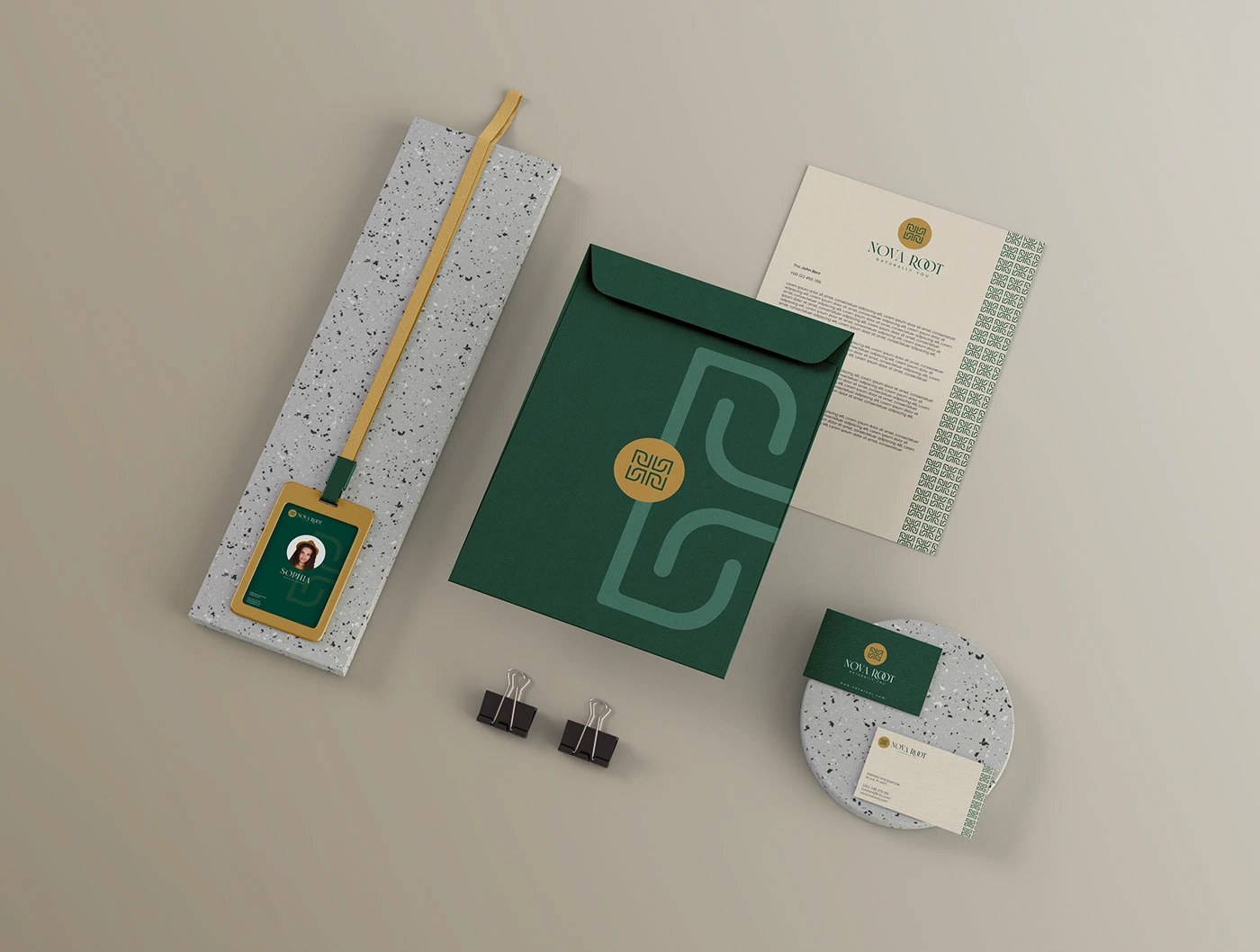 Nova Root skincare brand identity stationery suite with dark green business cards and gold foil