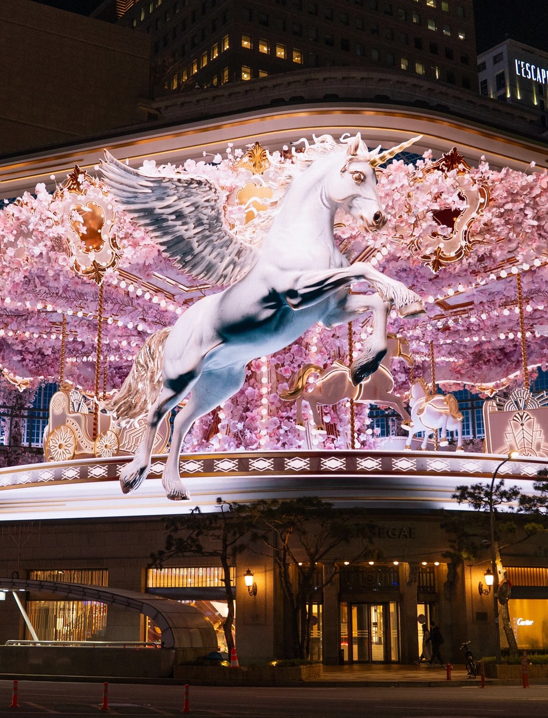 media facade mechanical carousel horse animation